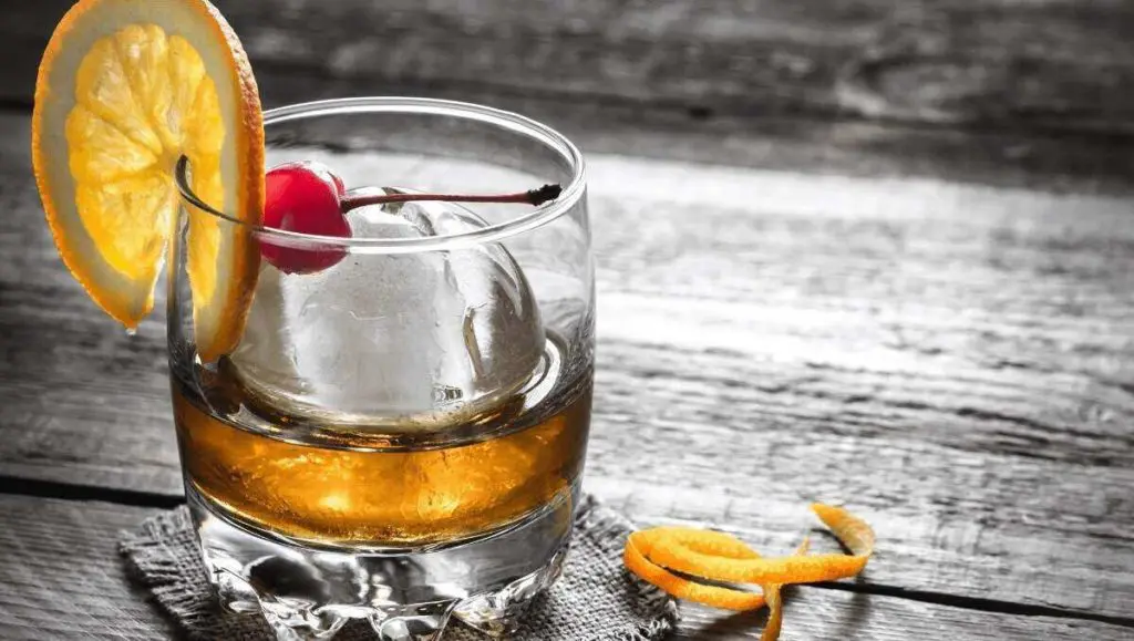 Old fashioned cocktail with garnish