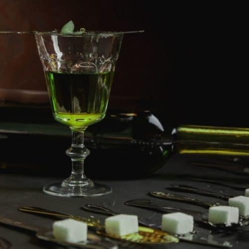 Absinthe Glass and Spoons with sugar cube