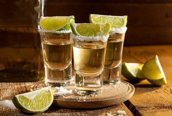 Tequila shots served with salt and lime