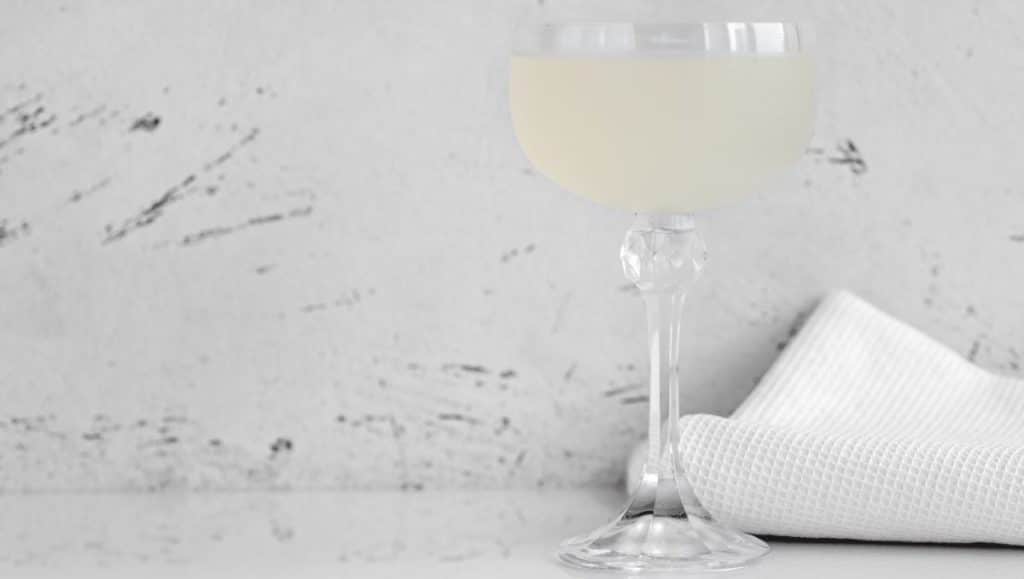 White Lady cocktail on white background