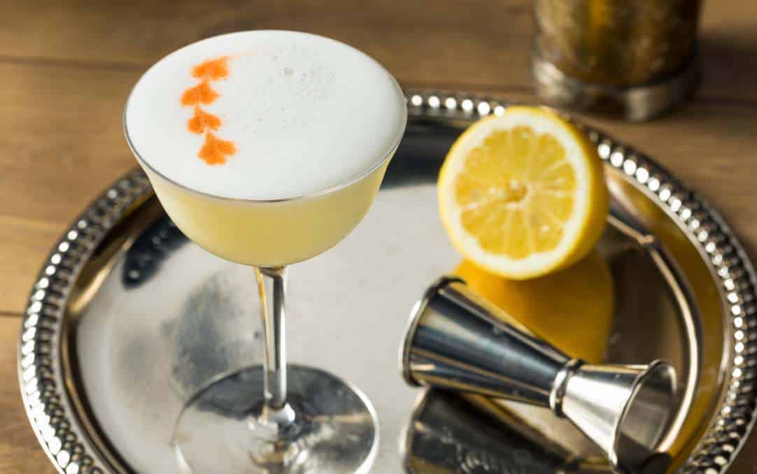 Pisco Sour Cocktail with Angostura Bitters and lemon