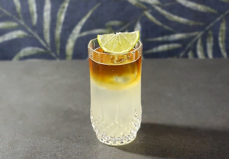 Dark 'n' Stormy cocktail in highball glass