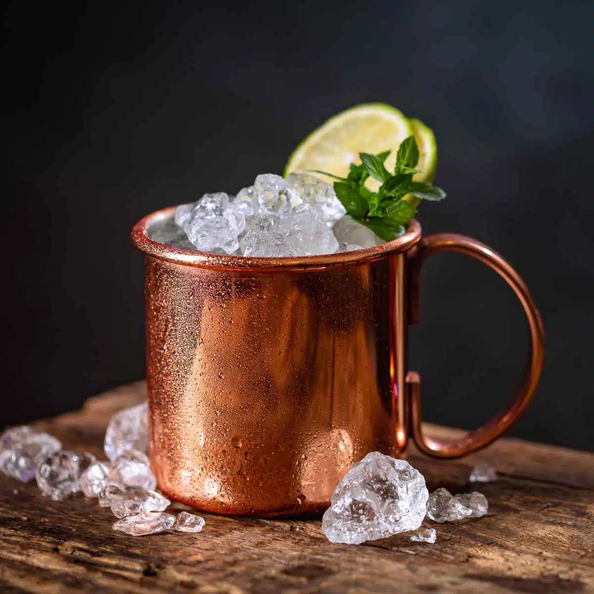 Moscow Mule cocktail in copper mug served with crushed ice