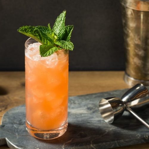 Zombie cocktail with mint sprig garnish