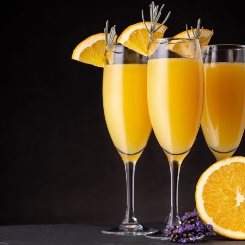 Mimosa cocktails with garnish