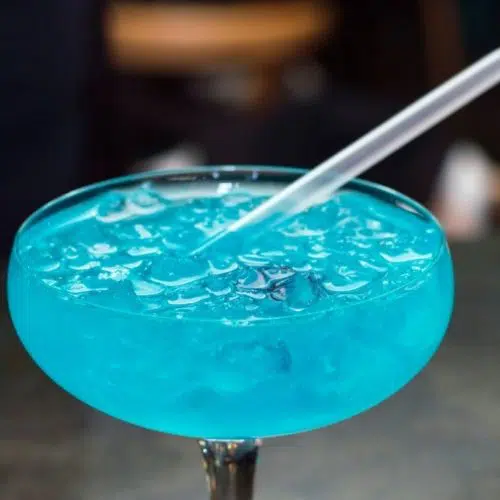 Blue Lagoon cocktail on table