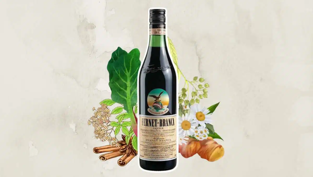 Fernet Branca bottle with ingredients in background