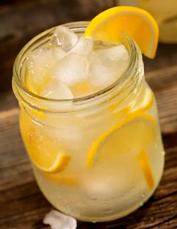 Lynchburg Lemonade with fresh lemons served in jar