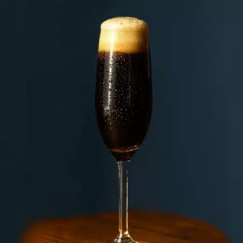 Black Velvet Cocktail with champagne and stout in champagne glass