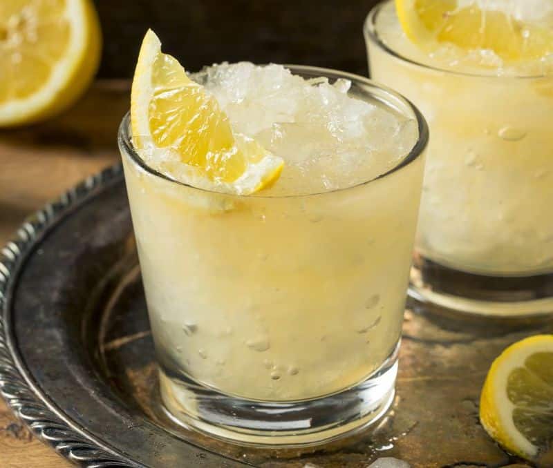 Whiskey Smash cocktail with lemon