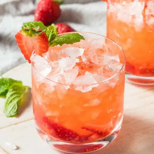 Smash cocktail made with strawberry & mint