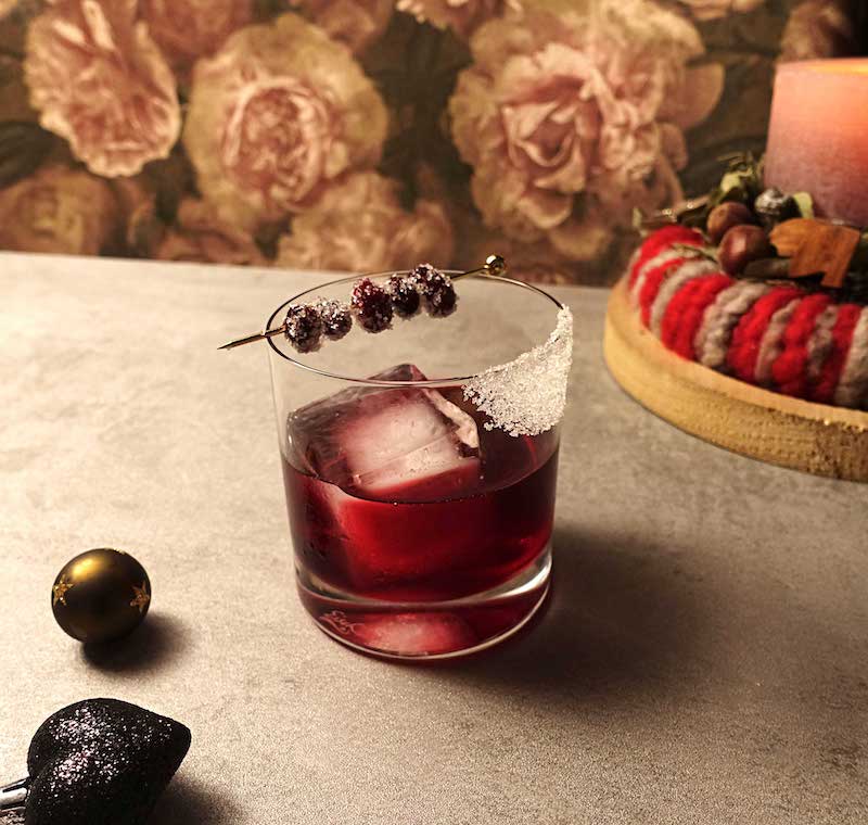 Festive Rye Old Fashioned with cranberries
