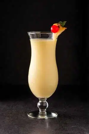 Painkiller cocktail on dark background