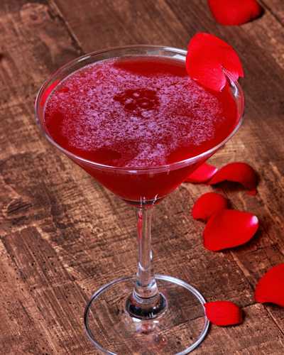 American Beauty drink garnished with petals 