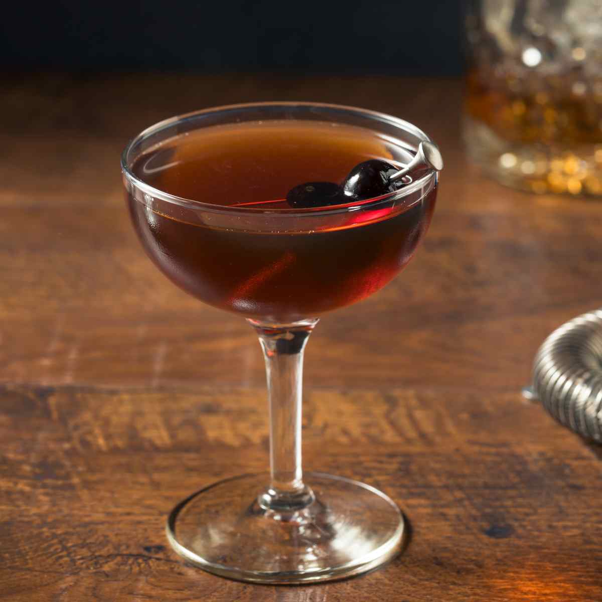 Manhattan cocktail on wooden table