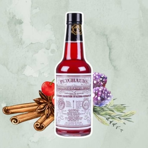 Peychaud's bitters bottle with cinnamon, berries, cherries, and herbs in the background