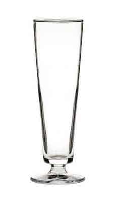 Sling cocktail glass on white background