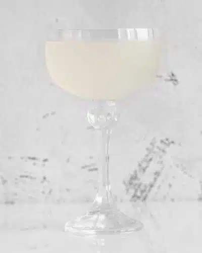 White Lady cocktail on white background