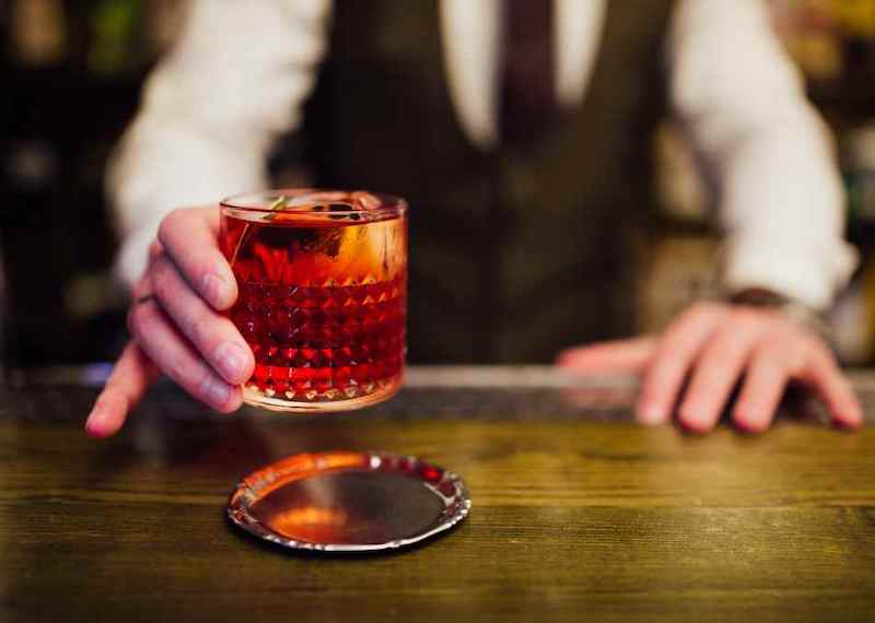Negroni cocktail served by bartender
