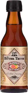 Bottle of The Bitter Truth Grapefruit bitters on white background